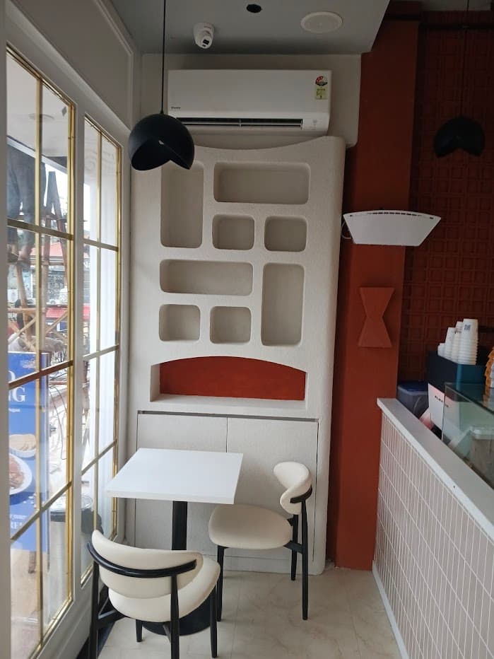 Box of fresh churros to go