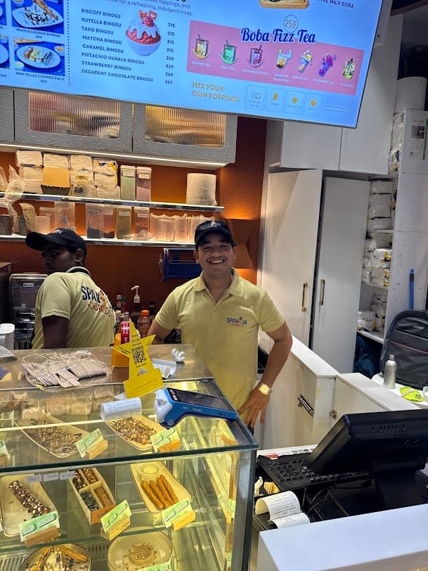 Sharing churros at a table